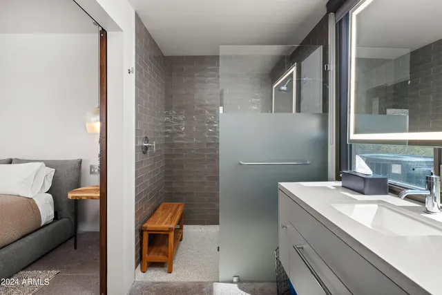 an aerial view of a house roof deck with furniture and a potted plant