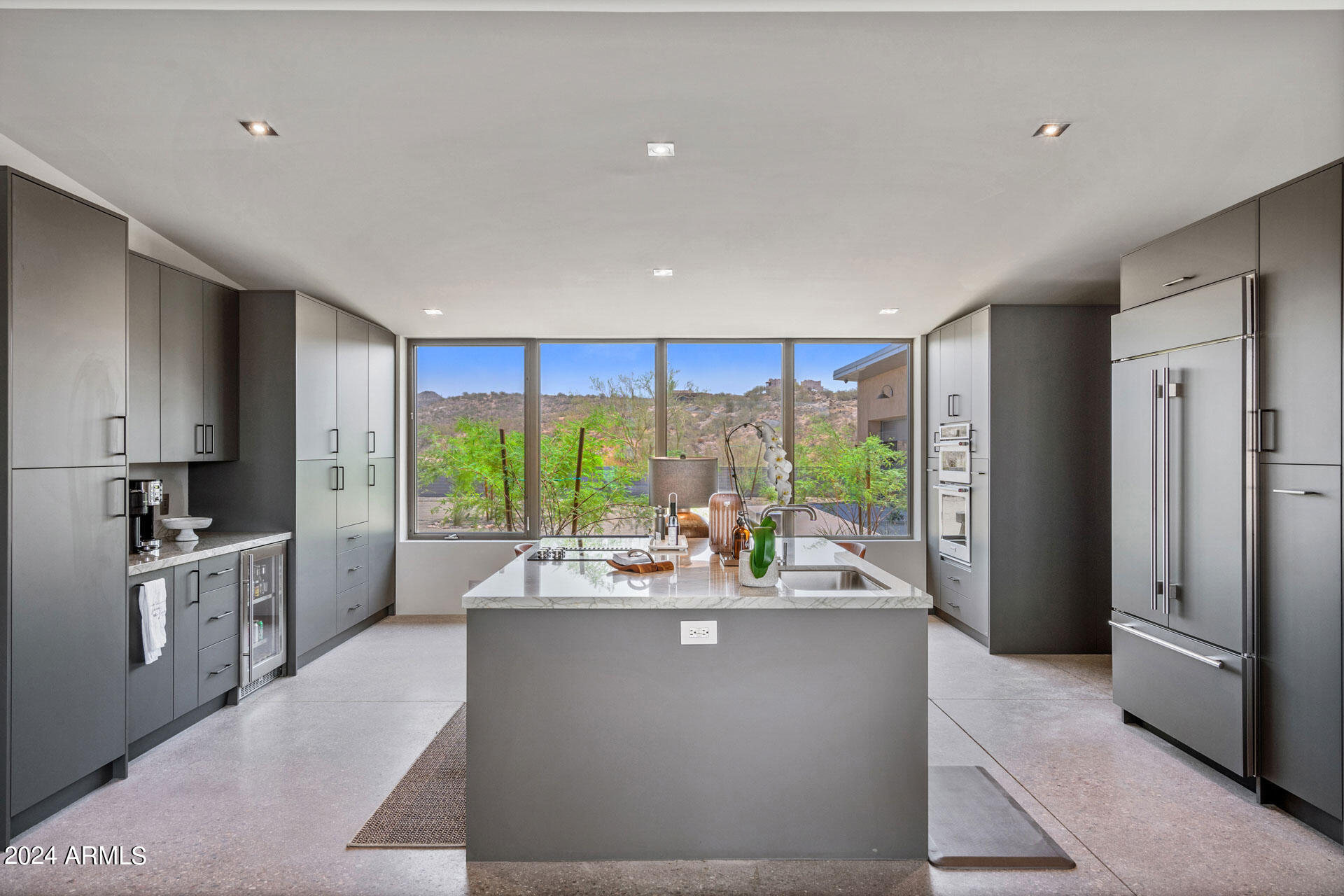 15212 North Sandy Blf Road Fort McDowell, AZ 85264 - Photo 9 of 66 a living room with stainless steel appliances kitchen island furniture and a large window