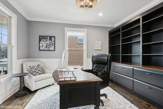 a view of entryway livingroom and hall with wooden floor