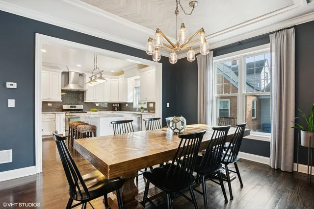 a bathroom with a granite countertop sink mirror and toilet