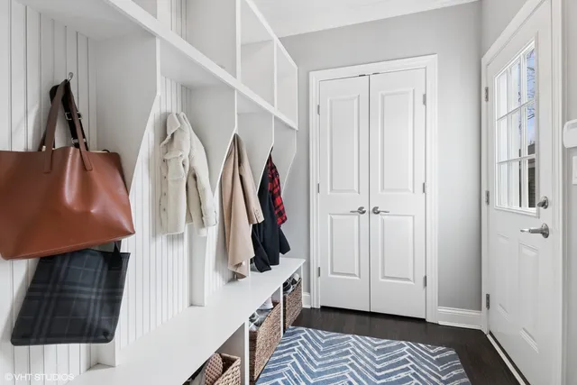 a bedroom with a bed and a table in it