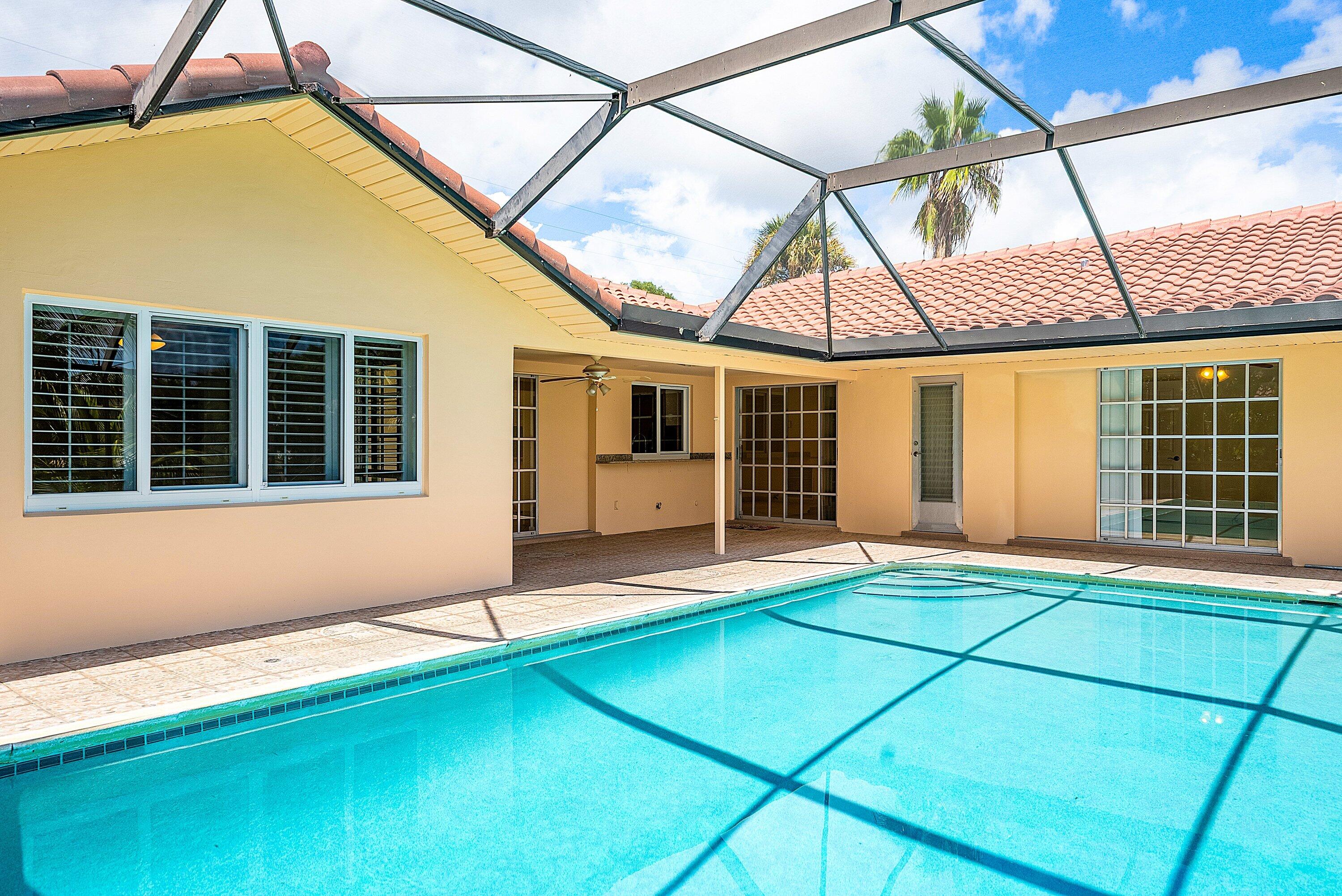 480 Northwest 11th Avenue Boca Raton, FL 33486 - Photo 33 of 43 a backyard of a house