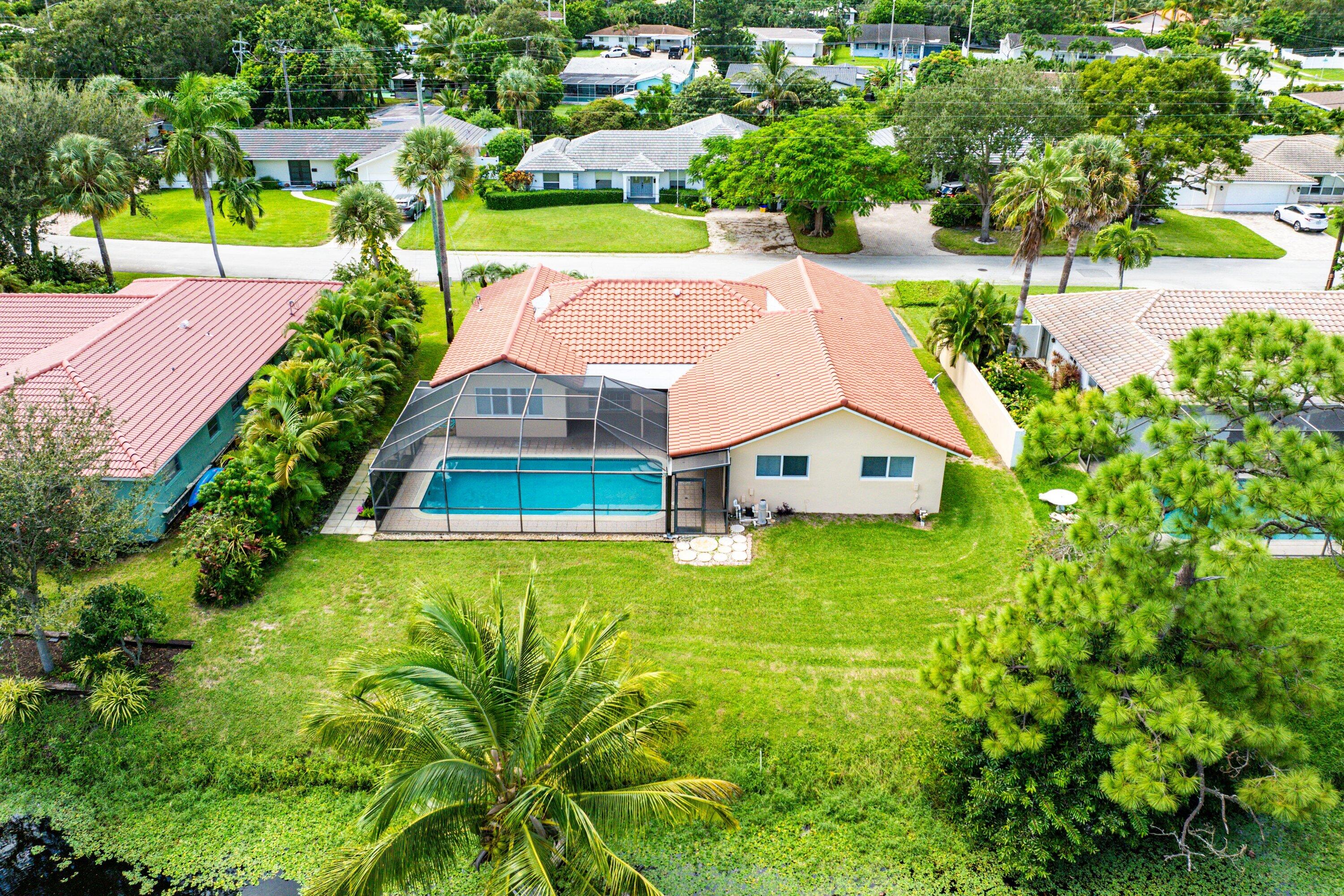 480 Northwest 11th Avenue Boca Raton, FL 33486 - Photo 43 of 43 an aerial view of a house with big yard
