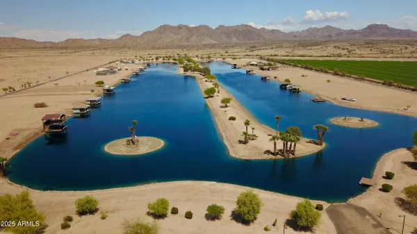 a car parked on the side of a lake