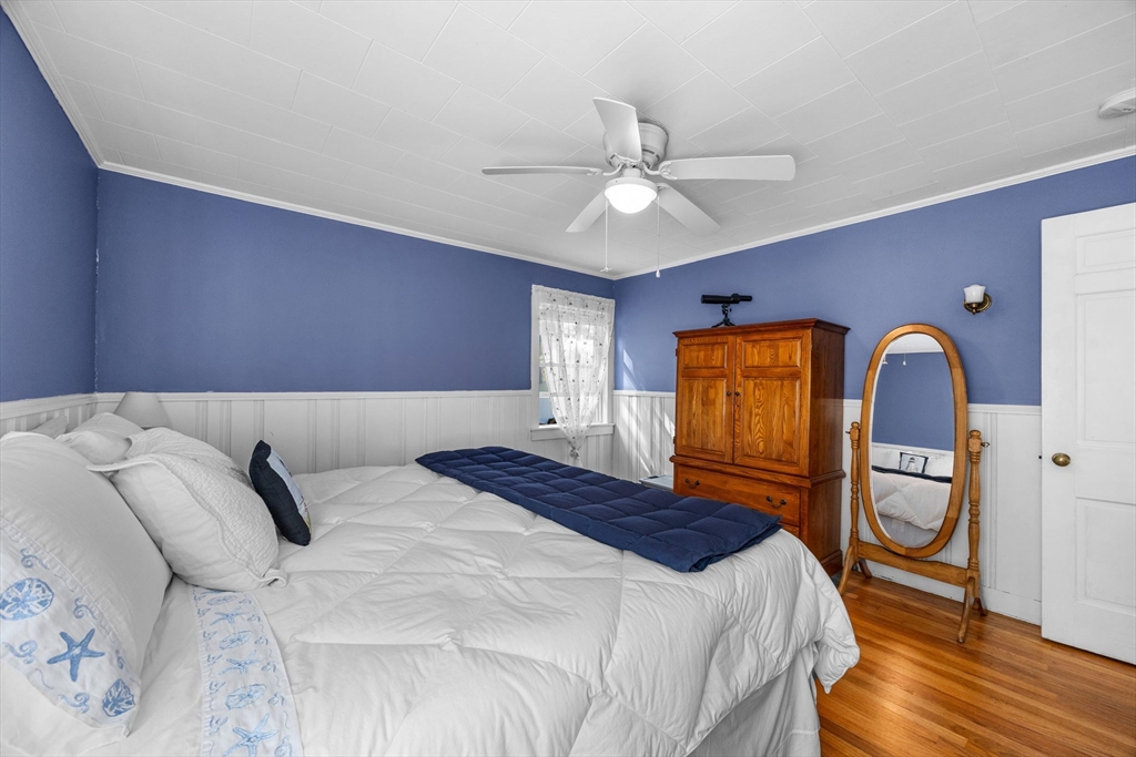 7 Spruce Drive Bourne, MA 02559 - Photo 11 of 39 a bedroom with a bed and a window