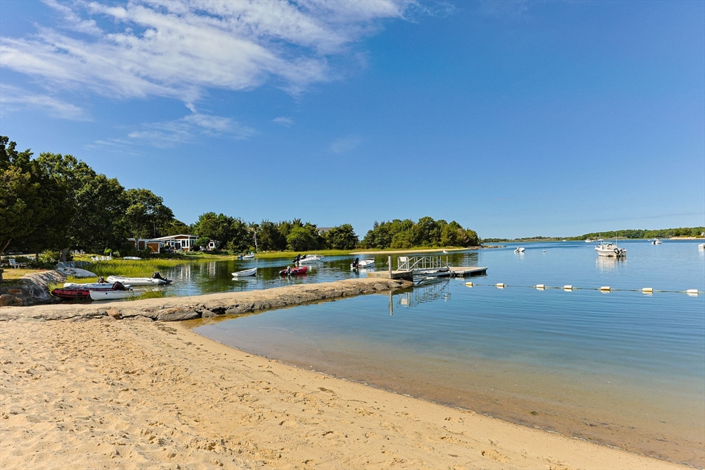 7 Spruce Drive Bourne, MA 02559 - Photo 31 of 39 a view of a swimming pool with lounge chair