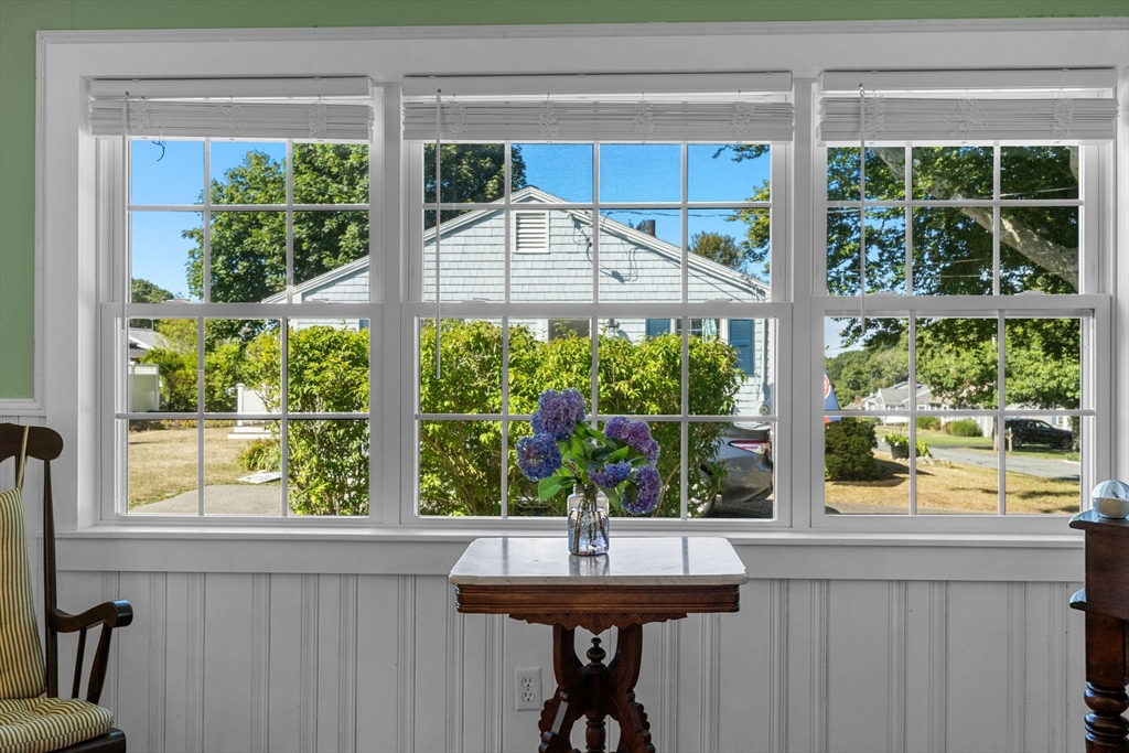 7 Spruce Drive Bourne, MA 02559 - Photo 6 of 39 a view of a kitchen area with a sink and wooden floor