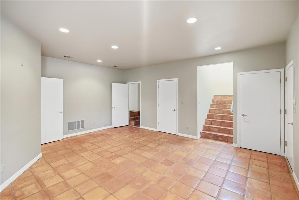 3606 Labrador Grapevine, TX 76051 - Photo 31 of 38 Spacious room featuring terra cotta tile flooring, recessed lighting, and multiple entryways