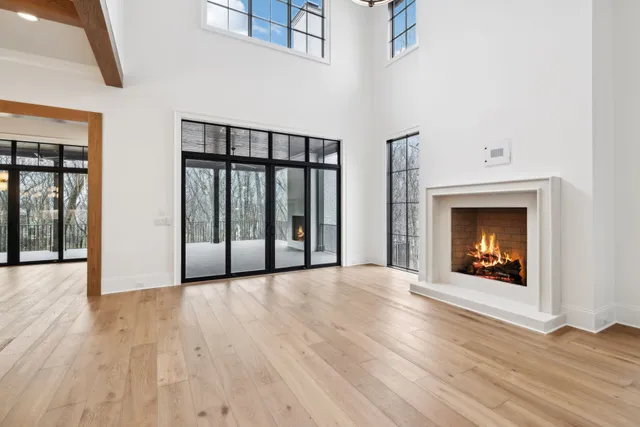 a bathroom with a bathtub and a window