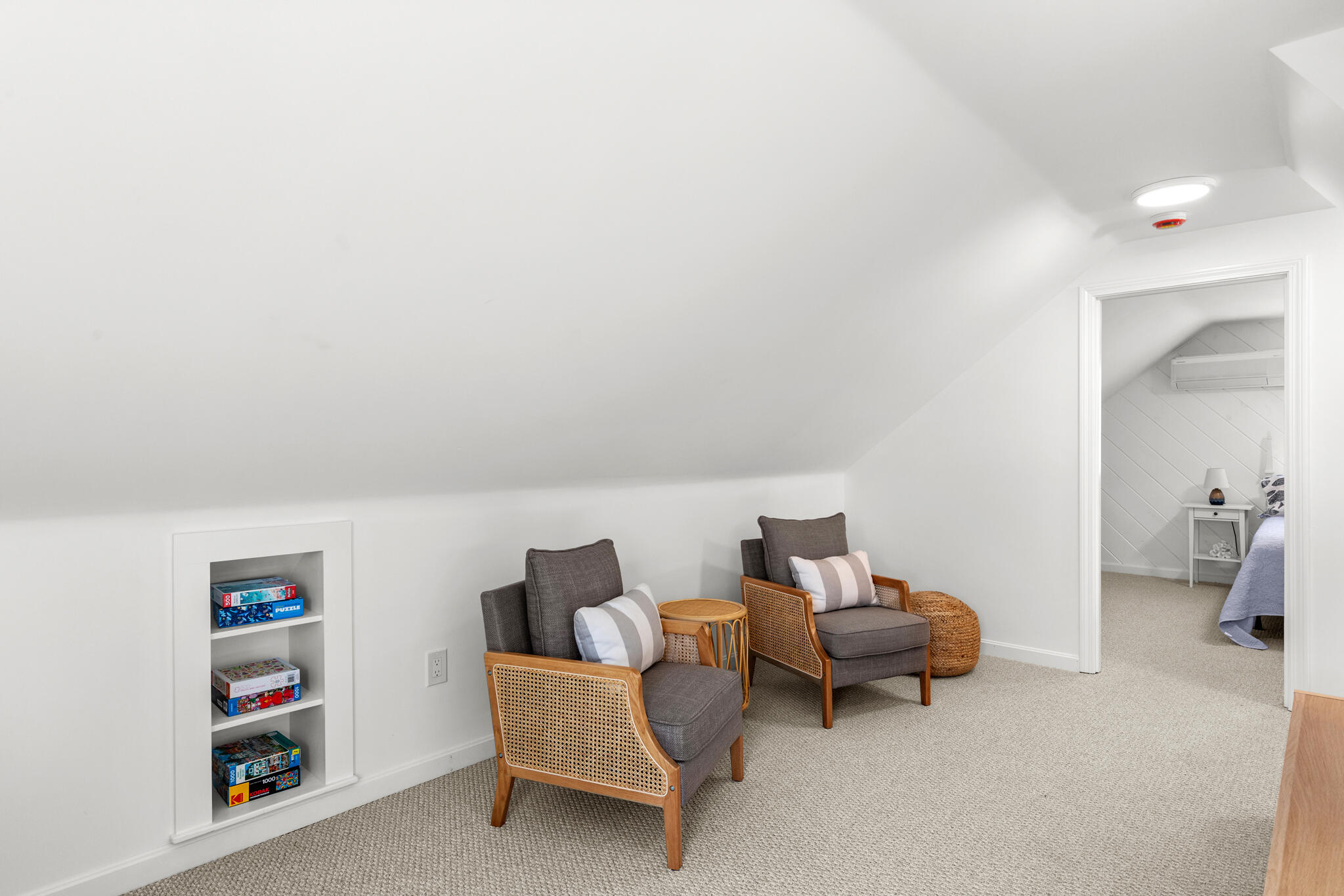1295 Massasoit Road Eastham, MA 02642 - Photo 30 of 32 a living room with furniture and a baby crib