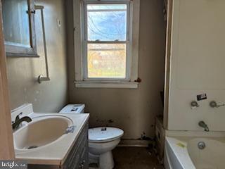273 Broad Street Carneys Point, NJ 08069 - Photo 13 of 14 a bathroom with a sink and a bathtub