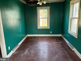 273 Broad Street Carneys Point, NJ 08069 - Photo 7 of 14 a view of a room that has a window