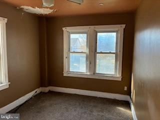 273 Broad Street Carneys Point, NJ 08069 - Photo 9 of 14 an empty room with a window