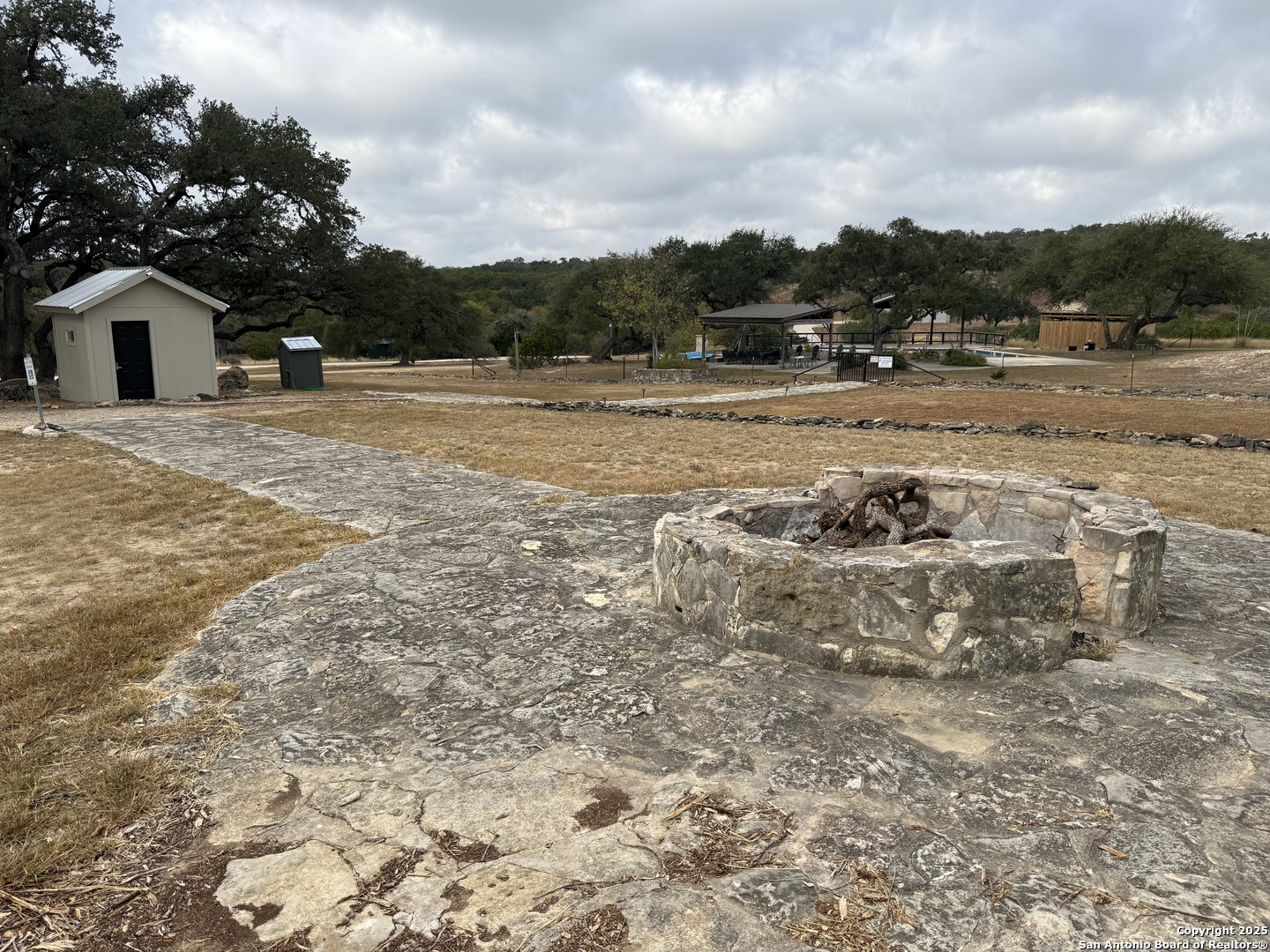 1629 Canyon Spring Branch, TX 78070 - Photo 11 of 14 a view of a yard with wooden fence