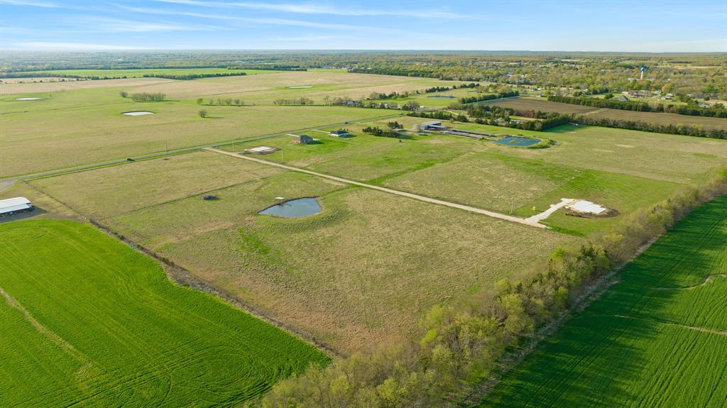 161 Private Road Blossom, TX 75416 - Photo 11 of 20 a view of an outdoor space and a lake view