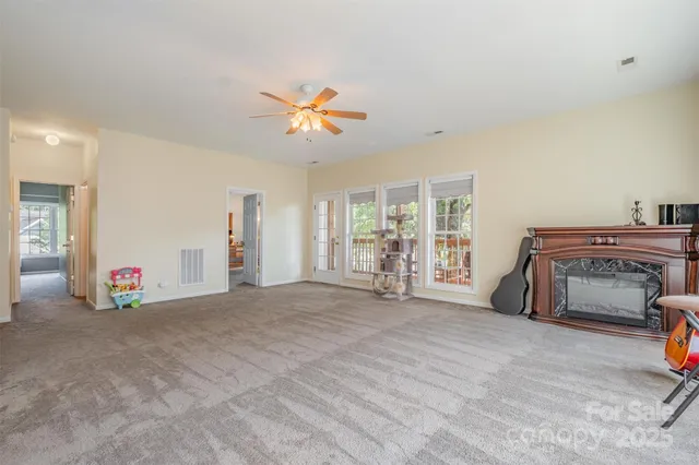 a view of a livingroom with natural light