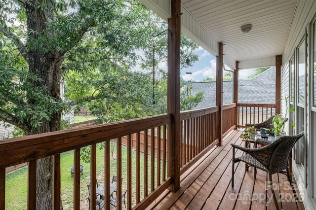 a view of a two chairs in the deck