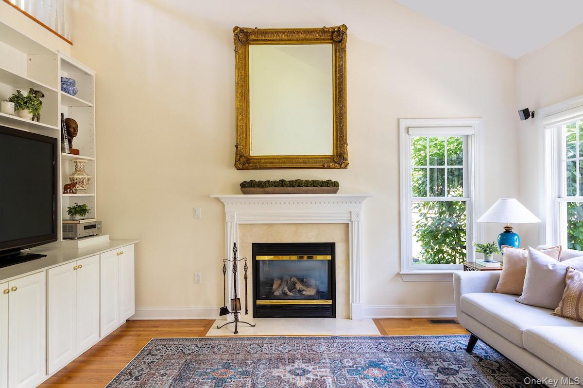66 Landing Drive Dobbs Ferry, NY 10522 - Photo 16 of 44 a living room with furniture and a fireplace