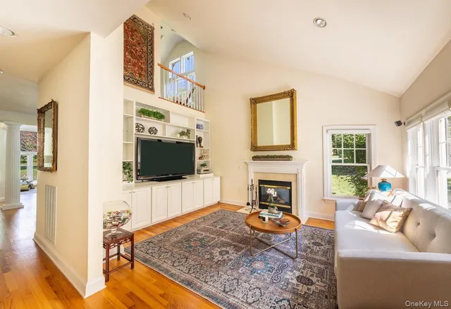 a bedroom with a bed window and table