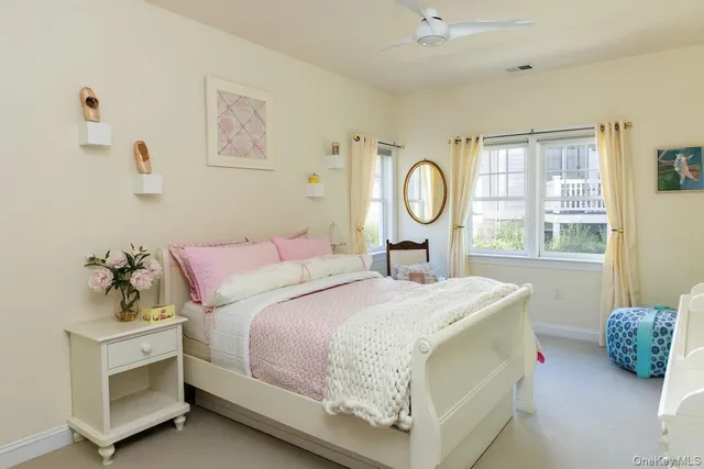 a room with furniture and a window