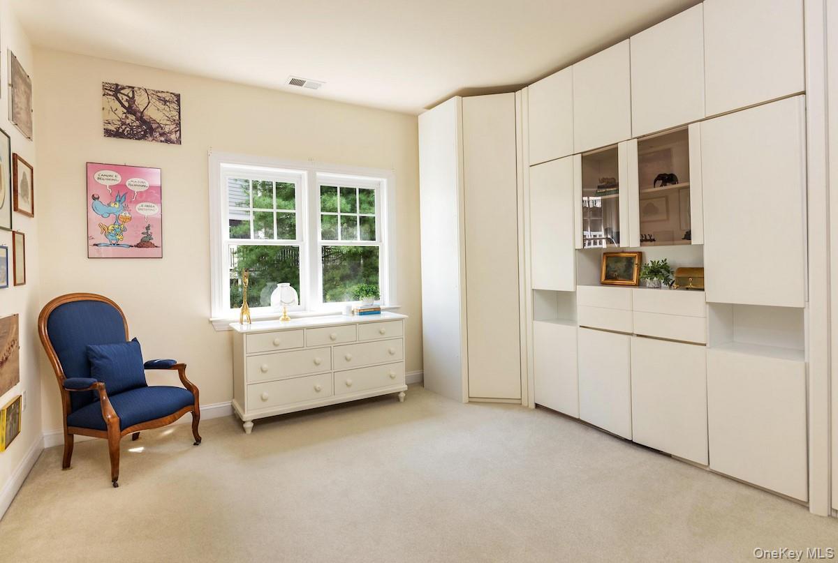 66 Landing Drive Dobbs Ferry, NY 10522 - Photo 23 of 44 a room with furniture and a window