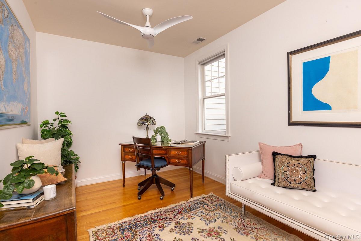 66 Landing Drive Dobbs Ferry, NY 10522 - Photo 25 of 44 a living room with furniture and a potted plant