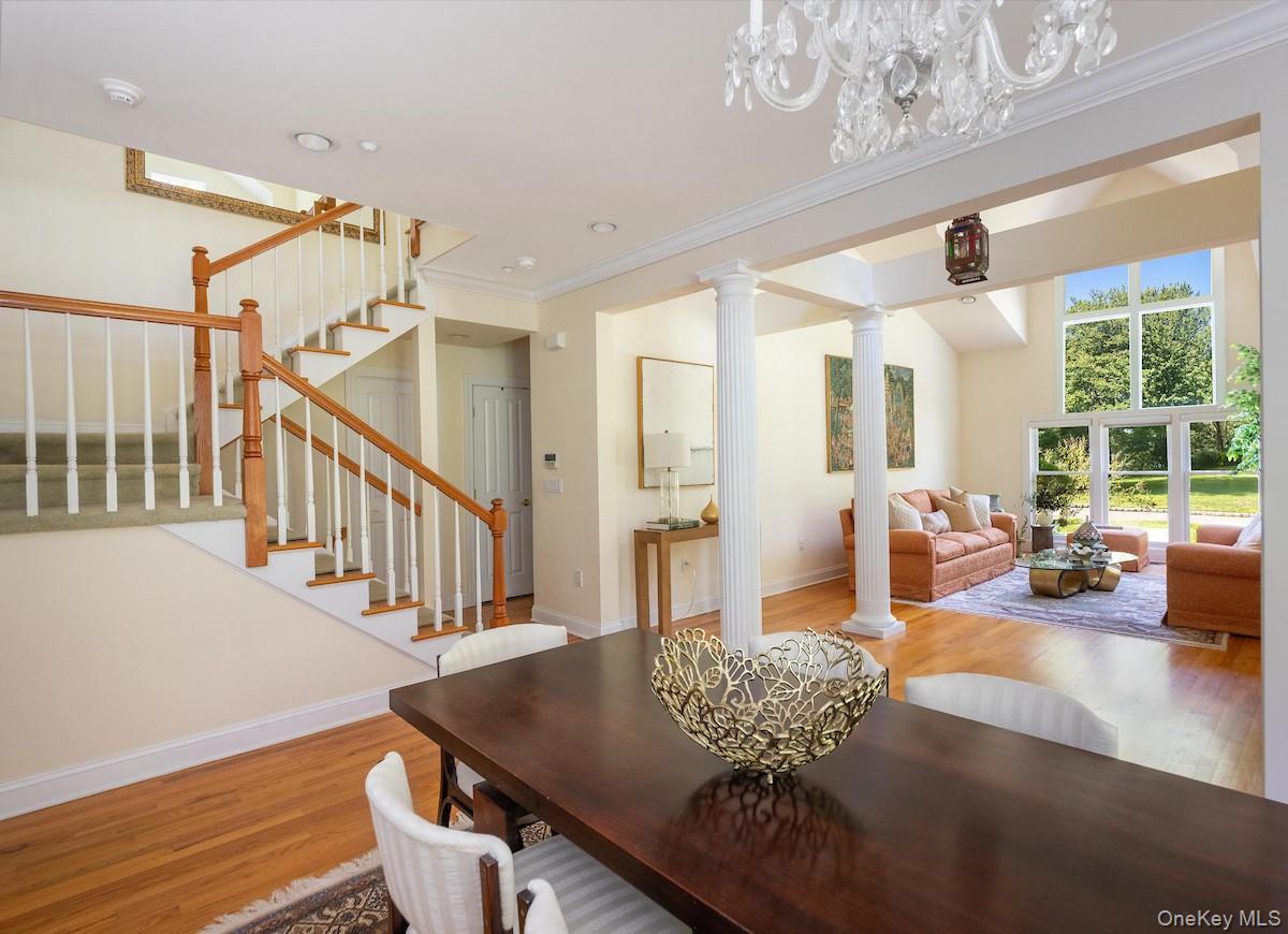 66 Landing Drive Dobbs Ferry, NY 10522 - Photo 9 of 44 a living room with furniture and a large window