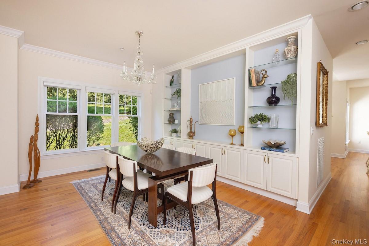 66 Landing Drive Dobbs Ferry, NY 10522 - Photo 10 of 44 a view of a dining room with furniture window and wooden floor