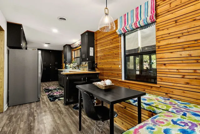 a view of a chairs and table in a patio
