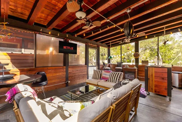 a view of sitting area in front of a house