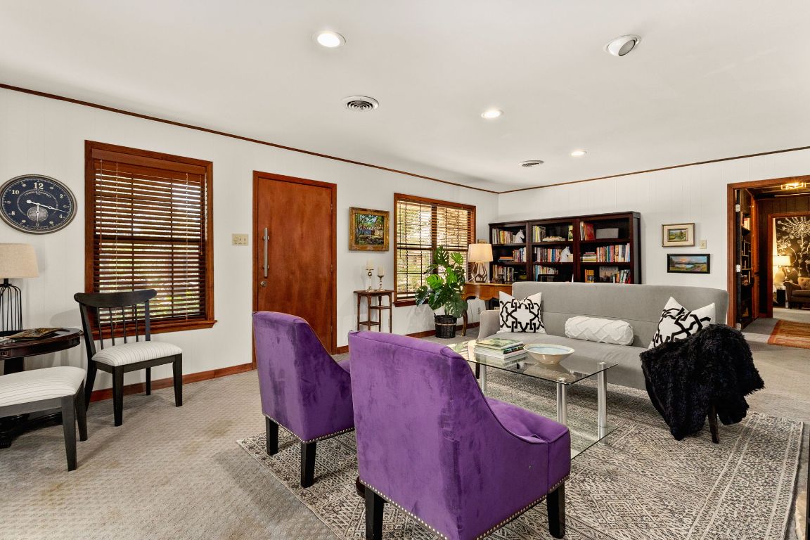 303 Lange Road Wimberley, TX 78676 - Photo 10 of 31 a living room with furniture and a large window
