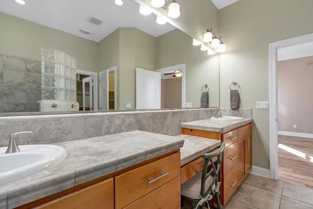 an aerial view of a house with a garden