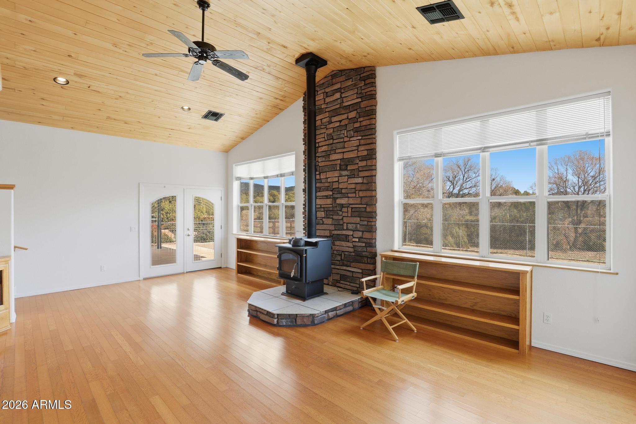 8780 Singletree Lane Payson, AZ 85541 - Photo 13 of 37 a living room with furniture windows and wooden floor