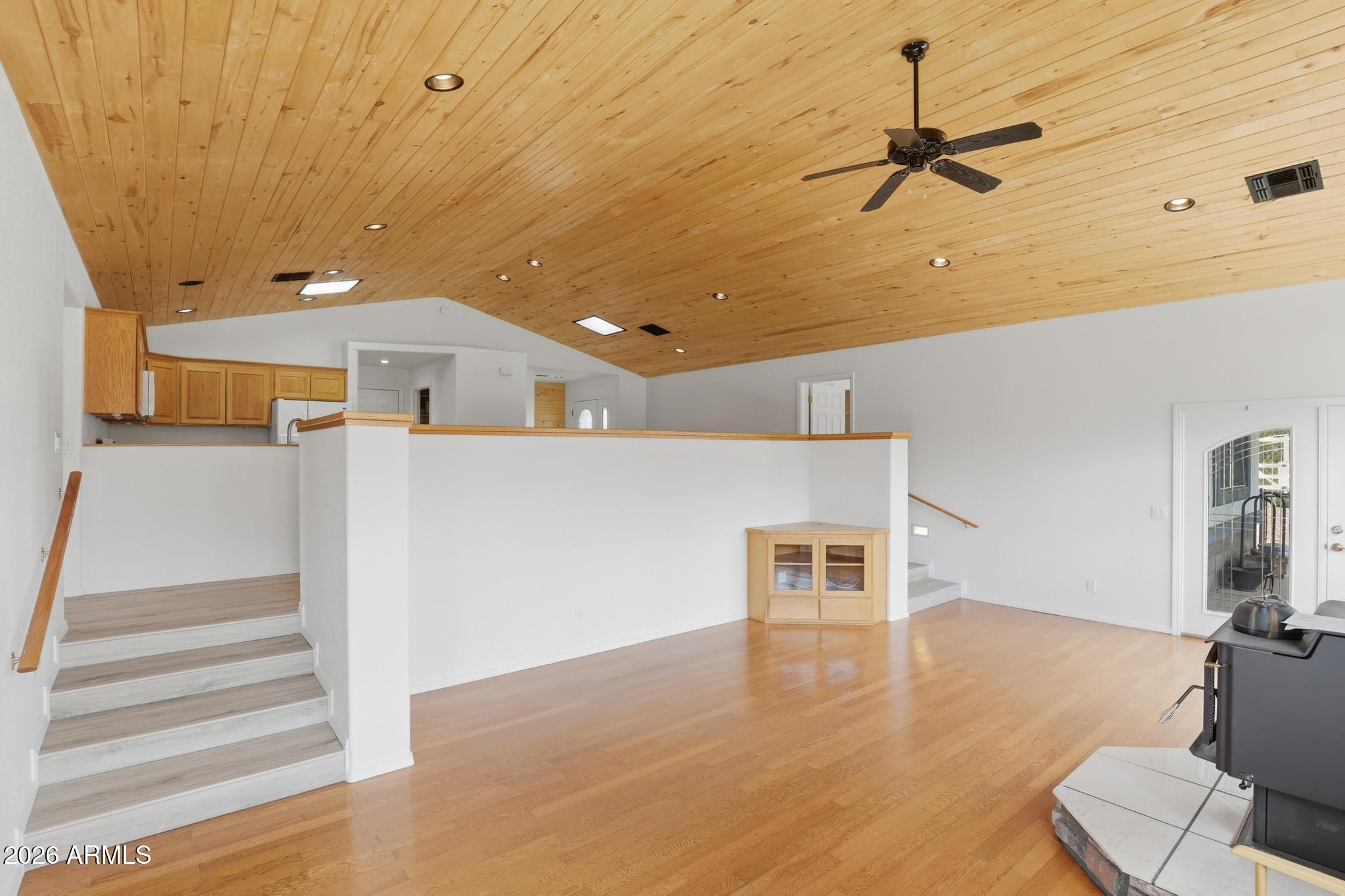 8780 Singletree Lane Payson, AZ 85541 - Photo 14 of 37 a view of a livingroom with a ceiling fan