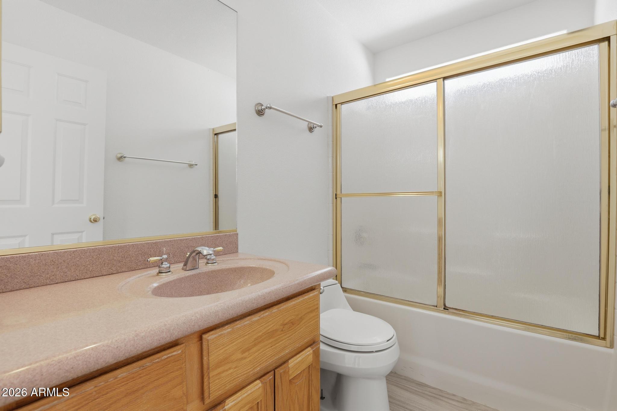 8780 Singletree Lane Payson, AZ 85541 - Photo 22 of 37 a bathroom with a sink and a mirror