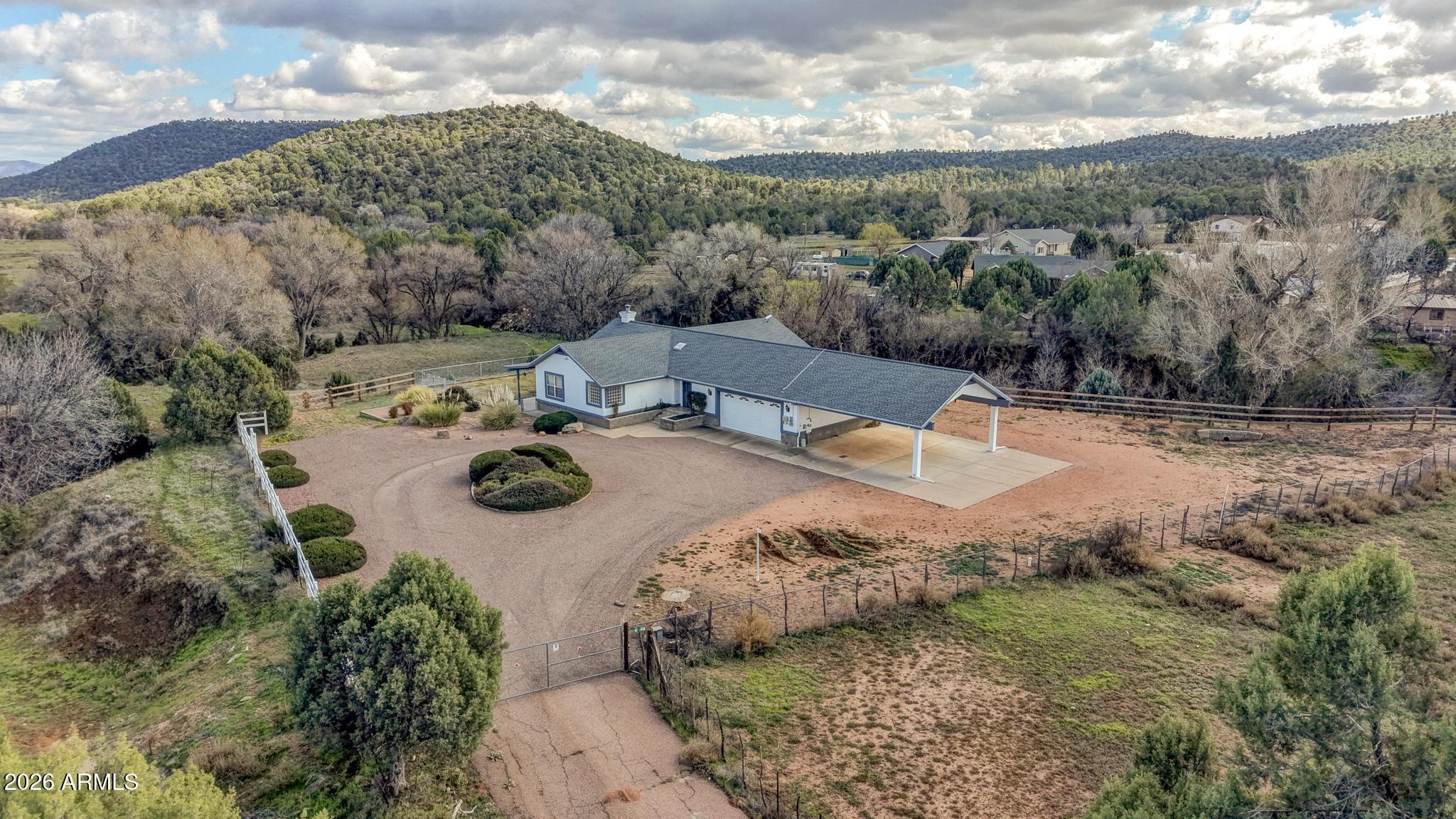 8780 Singletree Lane Payson, AZ 85541 - Photo 35 of 37 an aerial view of a house with yard swimming pool and outdoor seating