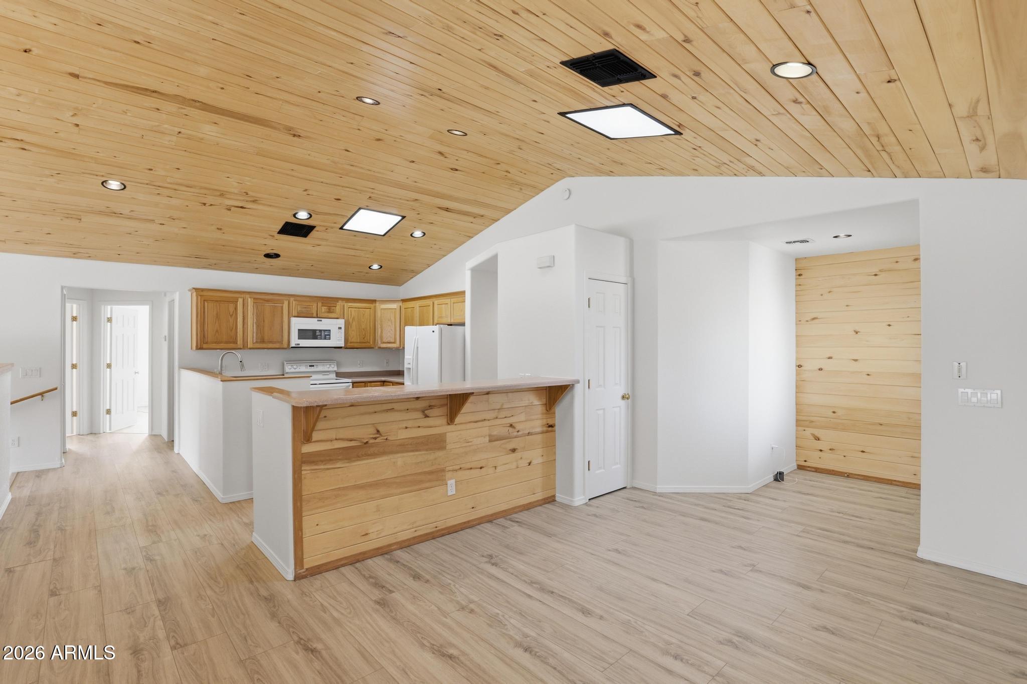 8780 Singletree Lane Payson, AZ 85541 - Photo 6 of 37 a room with furniture and wooden floor