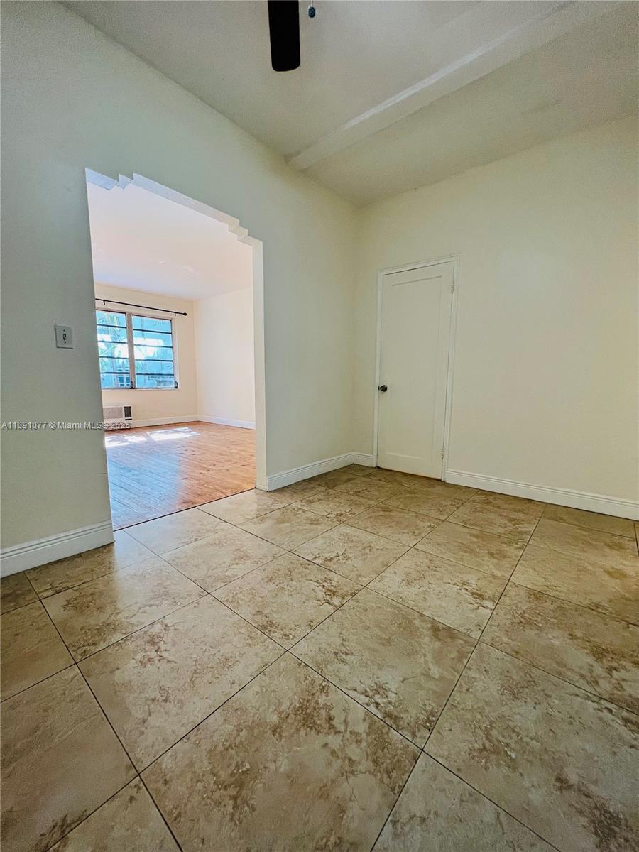 1141 Meridian Avenue, Unit 6 Miami Beach, FL 33139 - Photo 4 of 11 an empty room with a empty space and sink