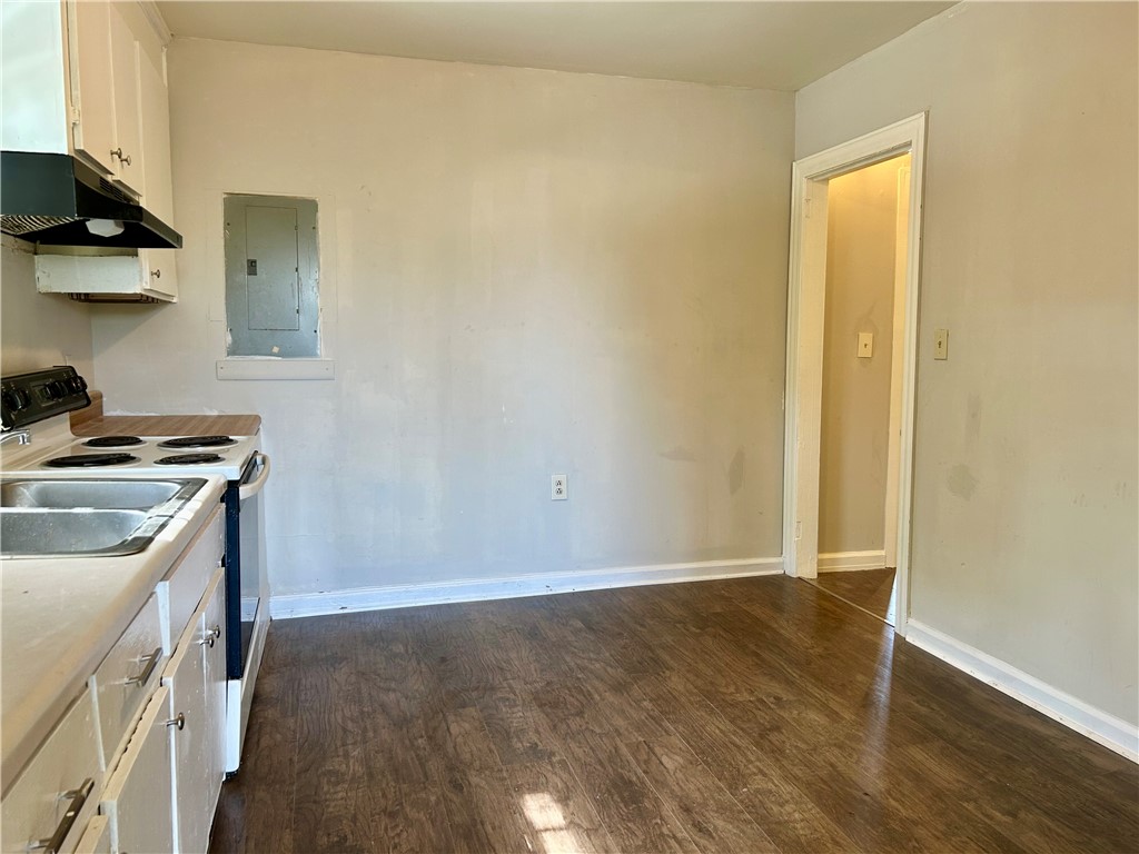 181 Sumter Street Anderson, SC 29621 - Photo 7 of 17 This cozy kitchen area offers functional design and practical flooring for everyday living.