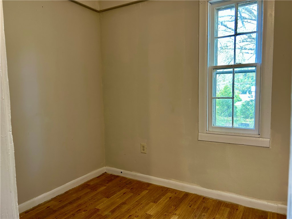 181 Sumter Street Anderson, SC 29621 - Photo 8 of 17 This cozy room offers abundant natural light through a classic window.