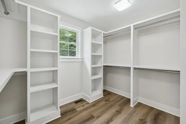 a view of an empty walk in closet