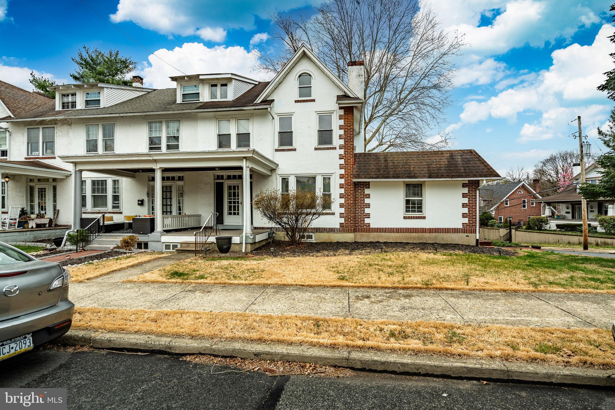 36 Fairview Street Boyertown, PA 19512 - Photo 1 of 40 a view of a white house with a swimming pool