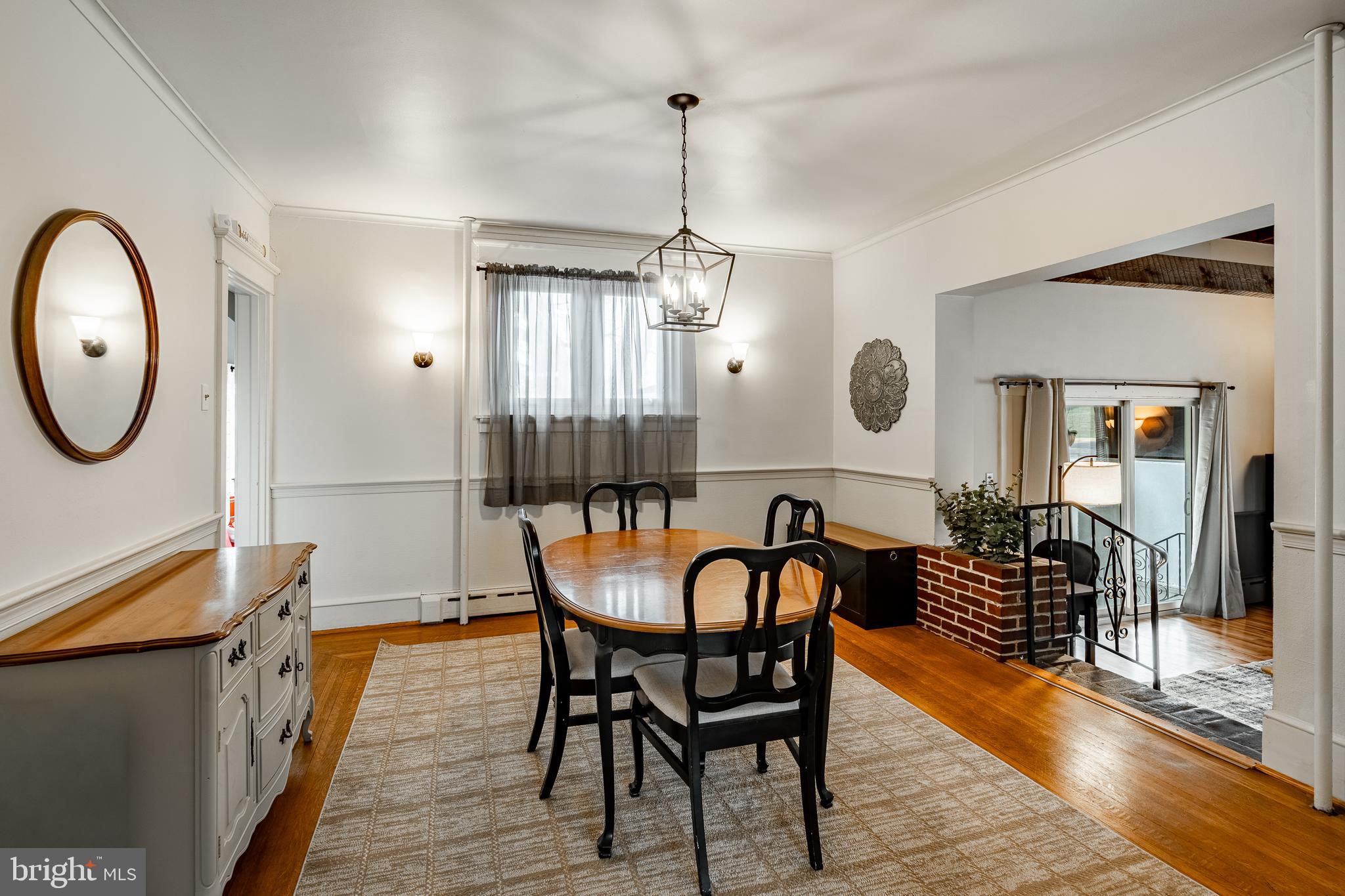 36 Fairview Street Boyertown, PA 19512 - Photo 17 of 40 a dining room with furniture a chandelier and wooden floor