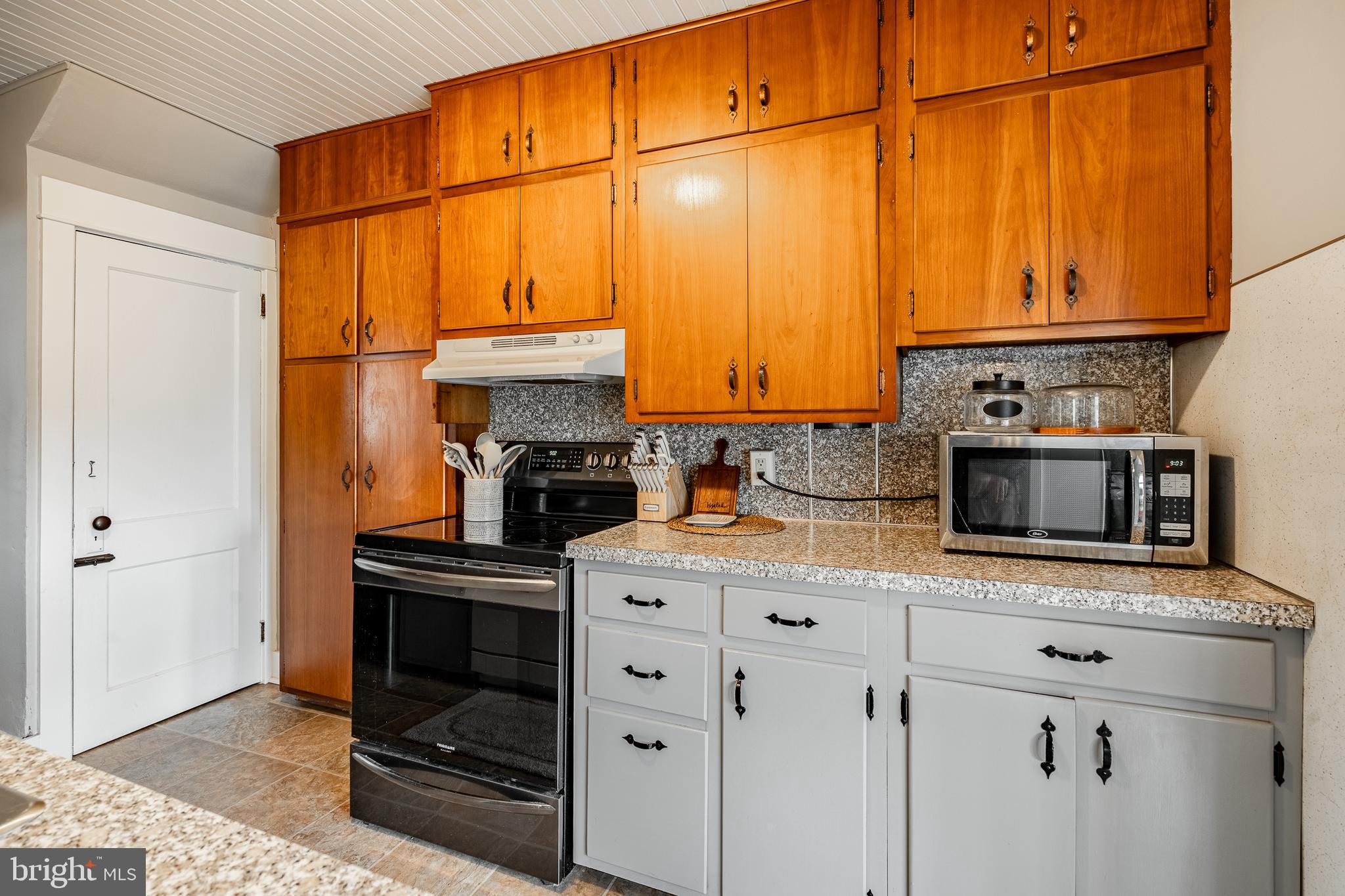 36 Fairview Street Boyertown, PA 19512 - Photo 8 of 40 a kitchen with stainless steel appliances a stove and a refrigerator