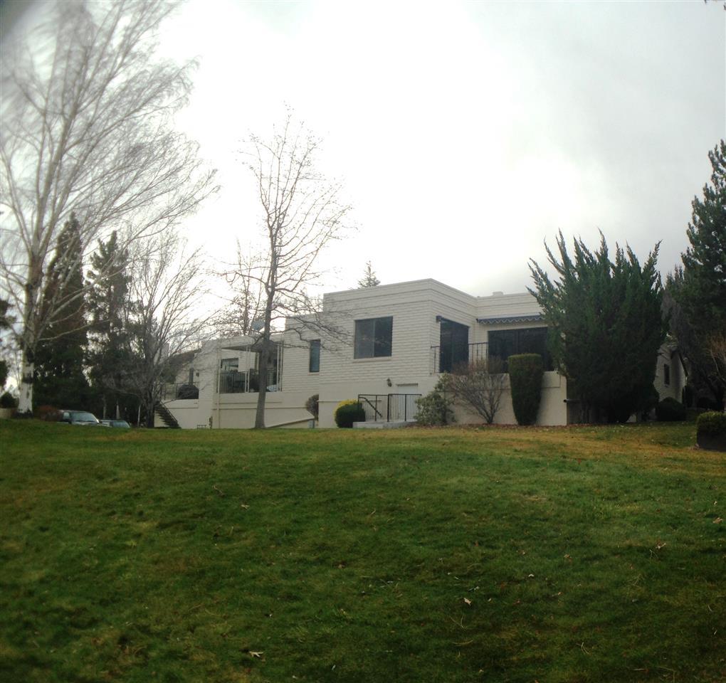 4959 Lakeridge Terrace West Reno, NV 89509 - Photo 1 of 1 a front view of house with yard and green space