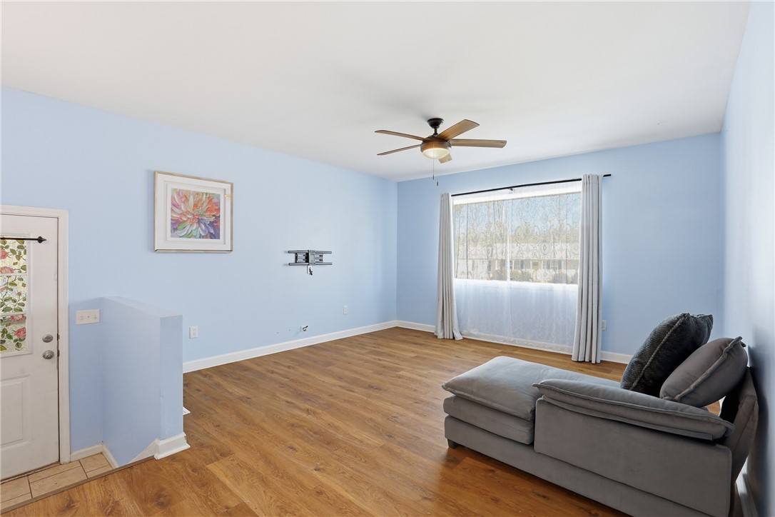 2703 Dellwood Lane Anderson, SC 29621 - Photo 7 of 26 Off the kitchen and next to the carport door is another living space.