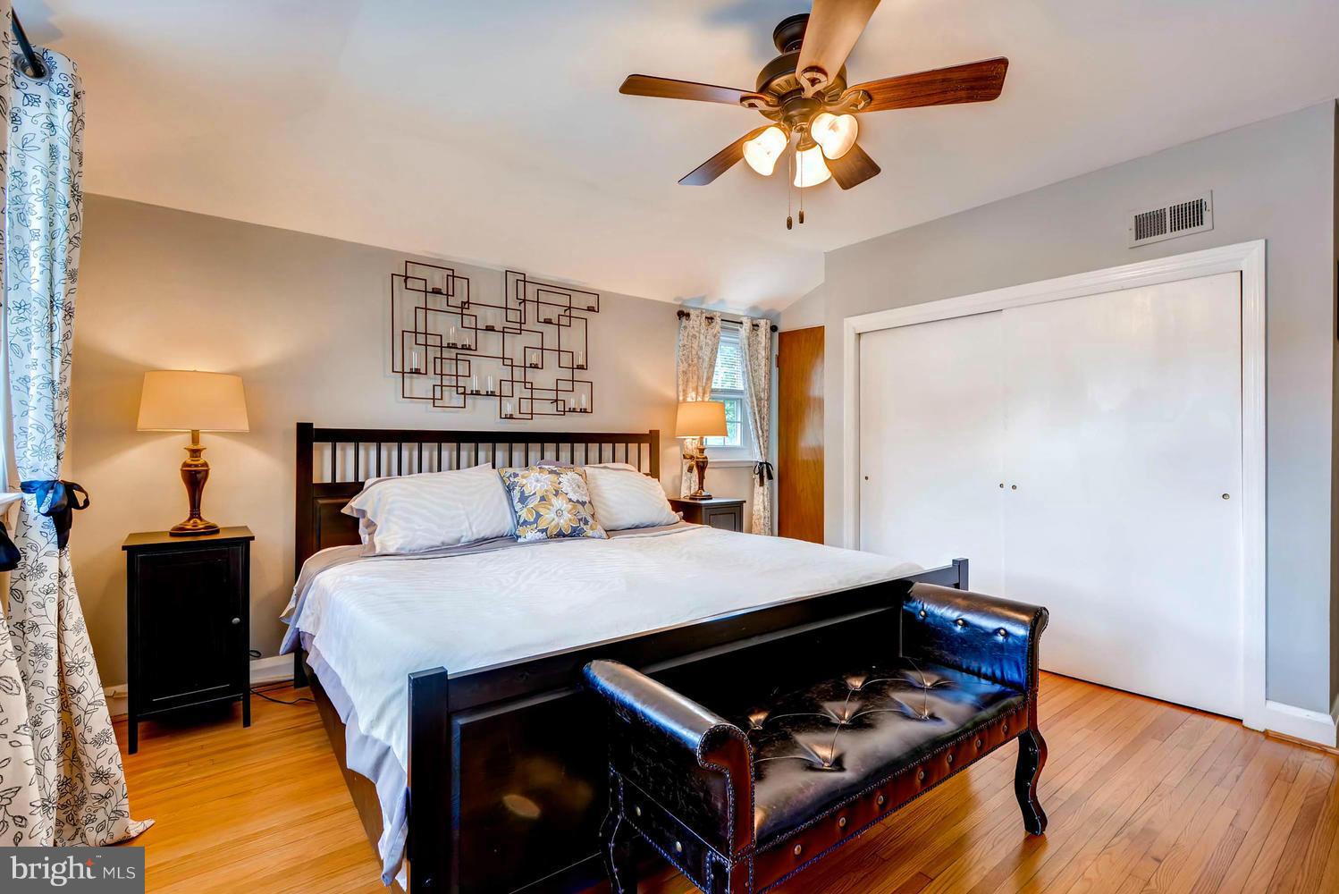 1615 Mussula Road Towson, MD 21286 - Photo 14 of 30 a bedroom with a bed and a table in it