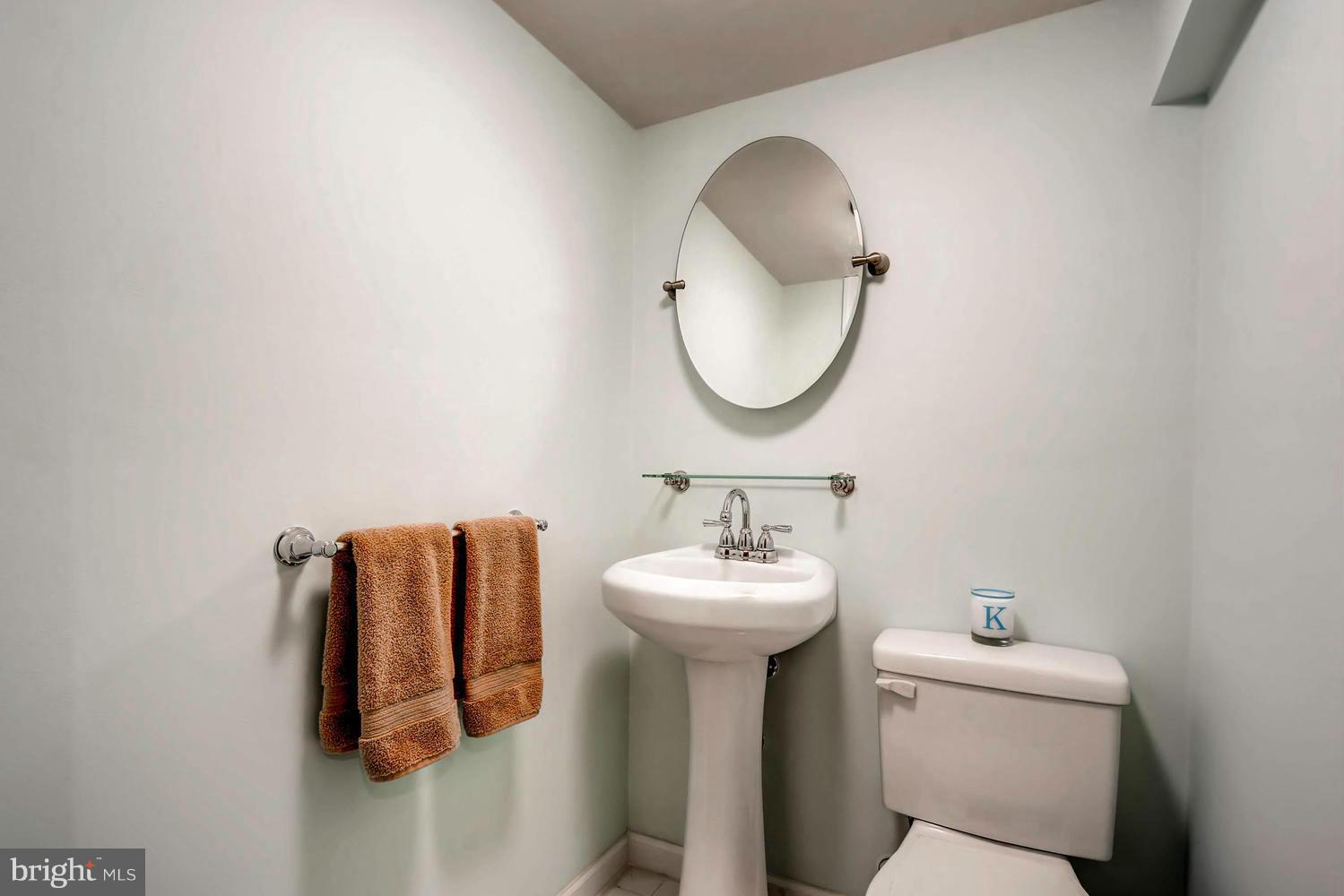 1615 Mussula Road Towson, MD 21286 - Photo 19 of 30 a bathroom with a sink and mirror