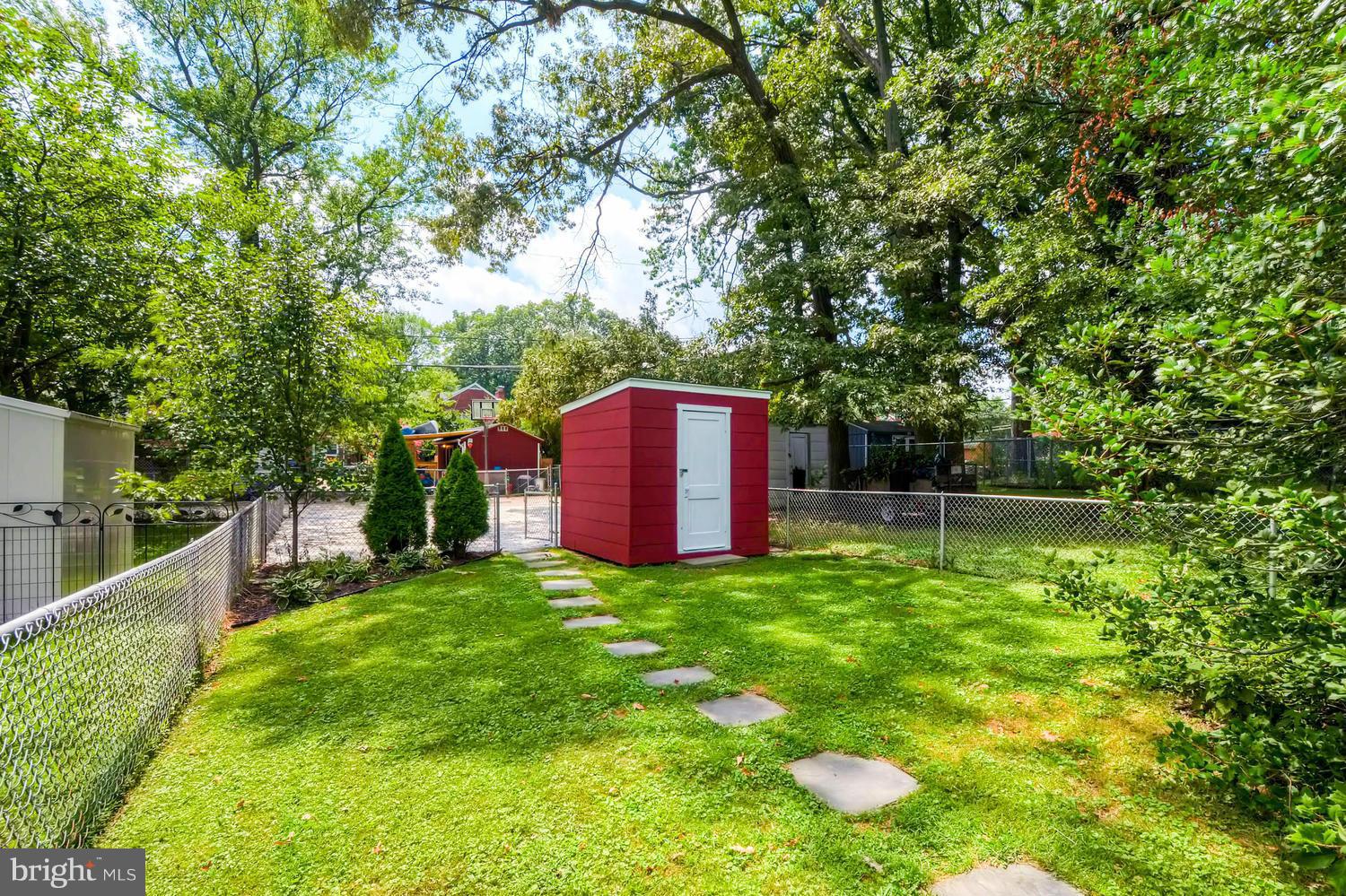 1615 Mussula Road Towson, MD 21286 - Photo 26 of 30 a view of a house with a yard and sitting area