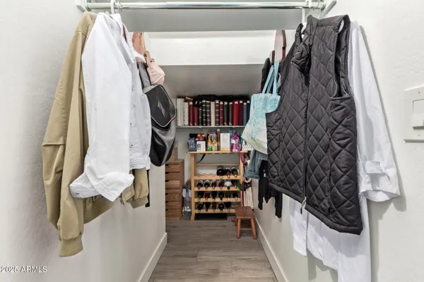 a view of house with backyard and outdoor seating